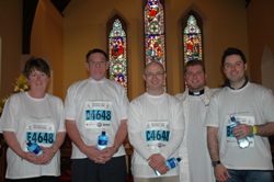 St Colmanell’s marathon team, from left to right, Rosemary Frayne, David Jackson, Derrick Dempsey and Tommy Moody, pictured with the rector of St Colmanell's, the Rev Mark Loney.